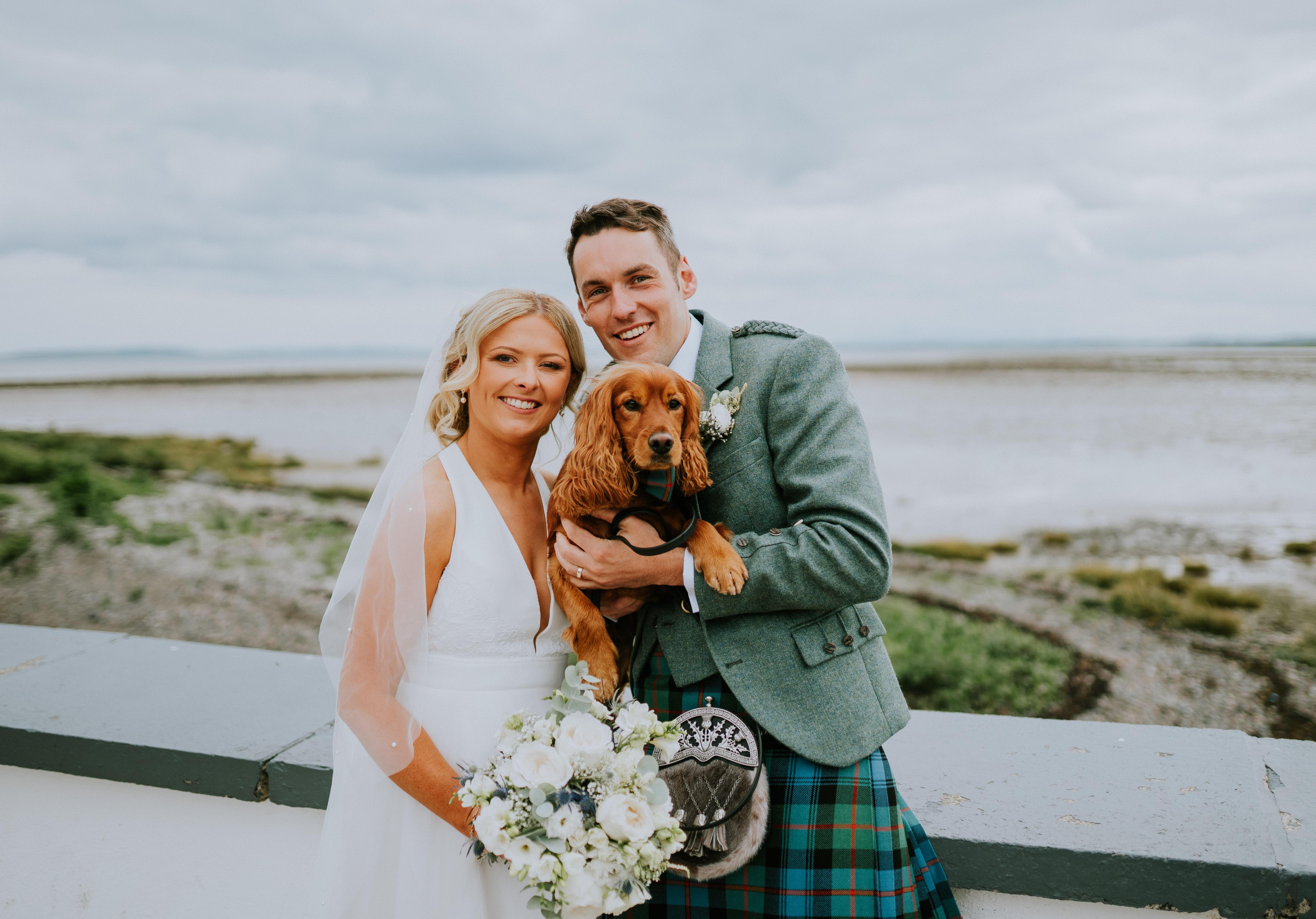 Bride and groom with dog at Orange Tree House pet friendly wedding venue Northern Ireland