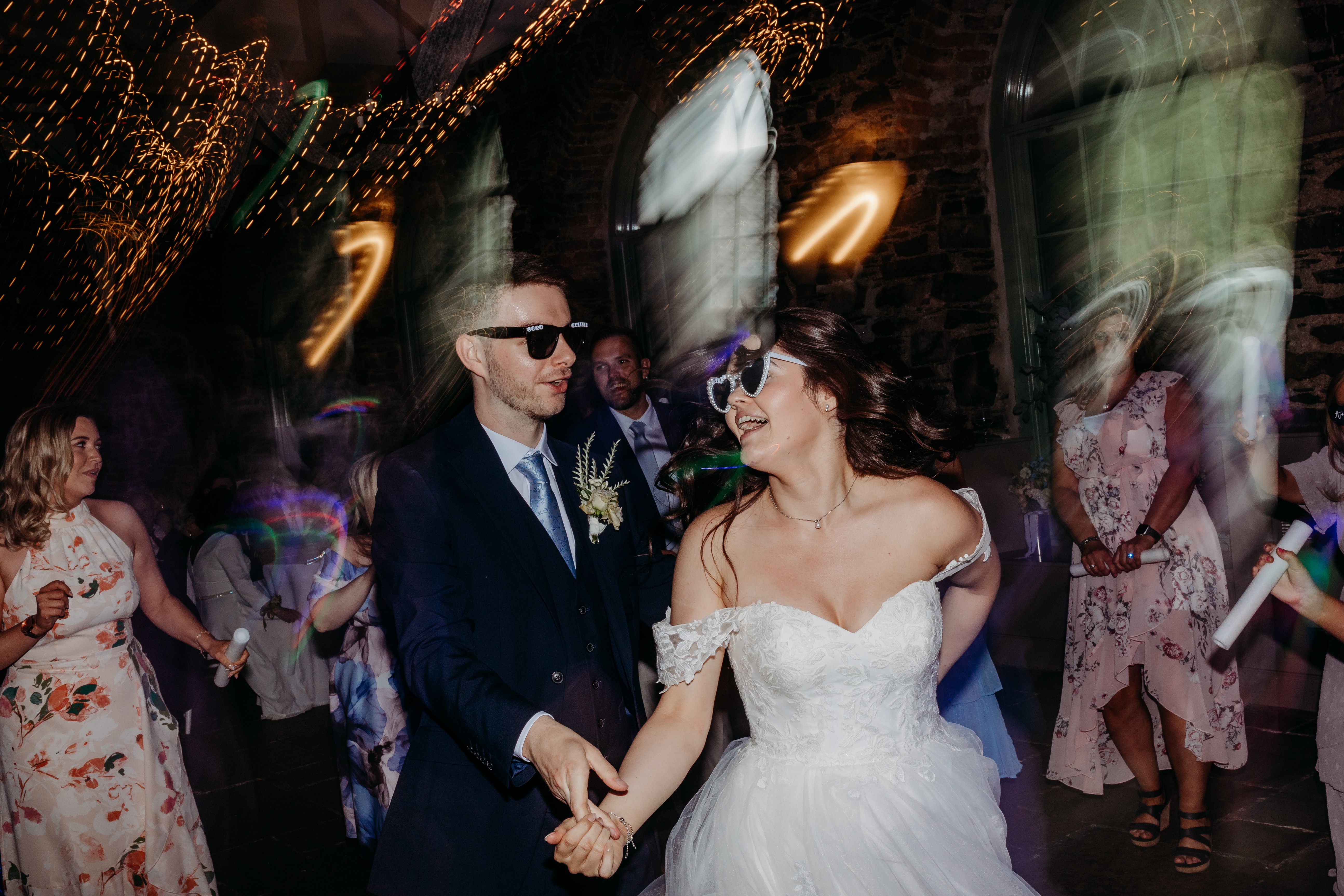 Wedding evening dancing and party atmosphere at Orange Tree House stone barn wedding venue Northern Ireland